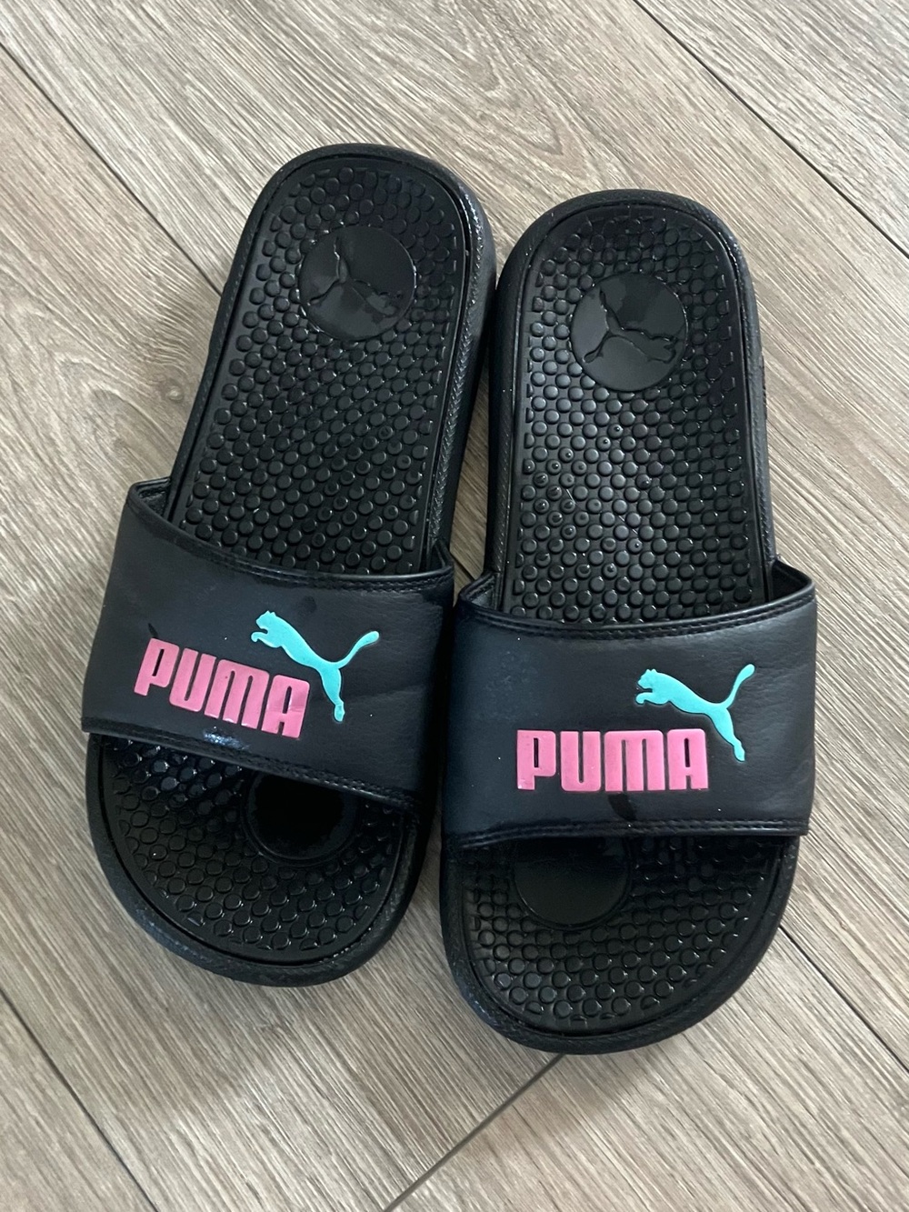 Puma Black Slide Sandals with Pink Accent